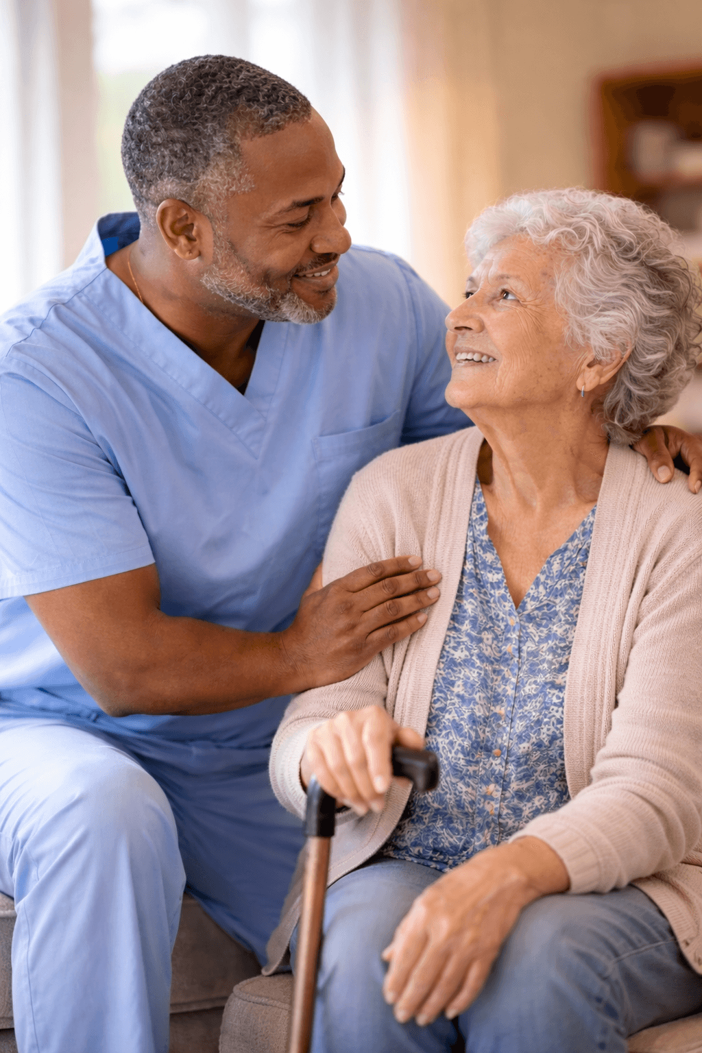 Caregiver and resident in home care setting